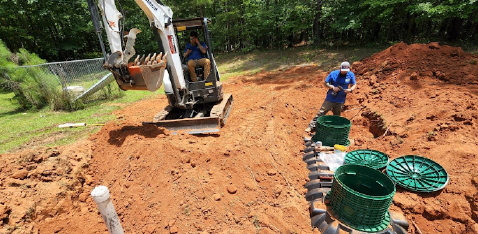 workers replacing the septic tank